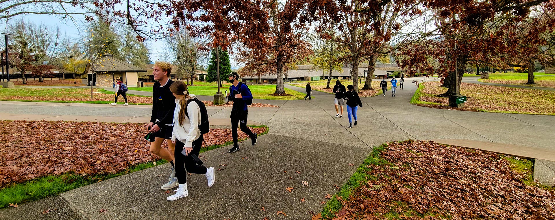 Students Walking Between Buildings on UCC Campus