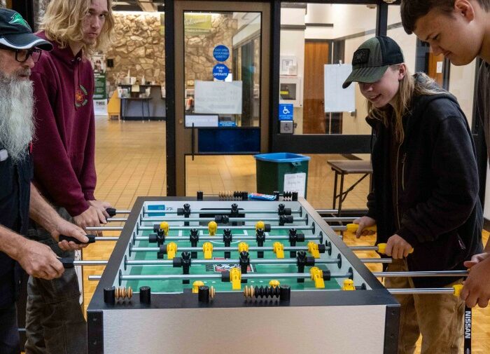students playing foosball