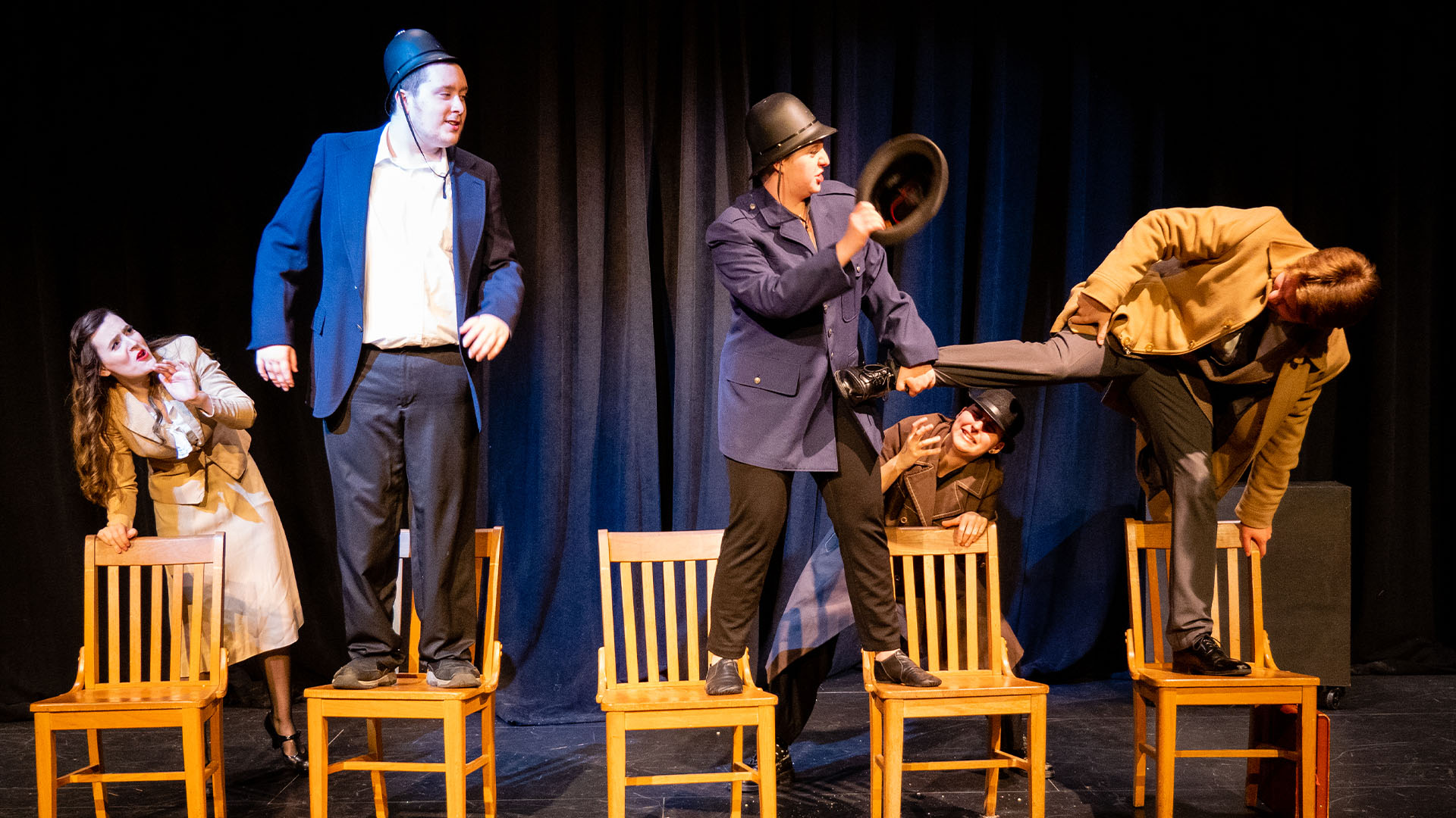 students performing theater